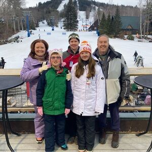 White 686 insulated long women’s snowboarding jacket.